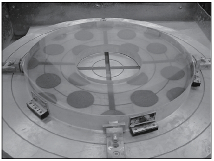 The primary mirror installed on the rotating table of the polishing machine.