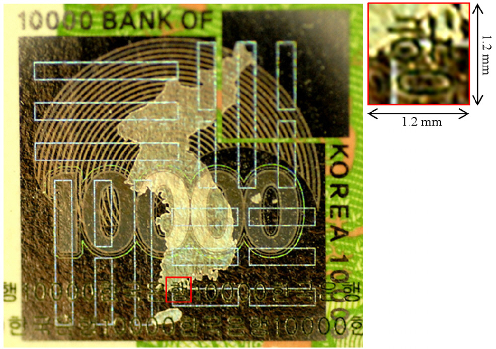 Photograph of the hologram band on a Koreanbanknote (10000 Won). The red rectangular of Fig. 4 isimaging region (1.2 mm× 1.2 mm) and its enlarged view isshown as inset of Fig. 4.