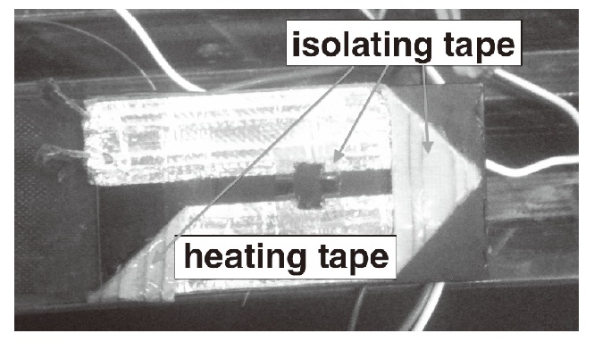 Heating tape configuration on metal part.