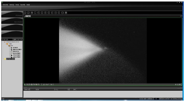 Radiant spot image of the transmitted laser beam observed with a nighttime camera.