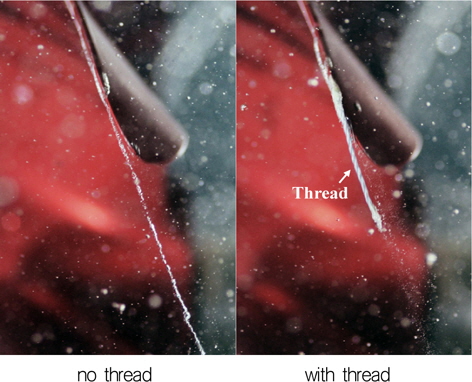 Instantaneous photographs of tip vortex cavitation with and without thread of 0.6mm diameter at J=1.01 and σ=5.49