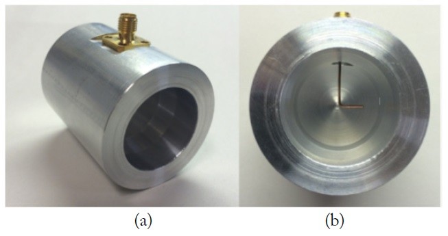 Photos of fabricated antenna. (a) 3D view and (b) L-shaped probe inside the antenna.