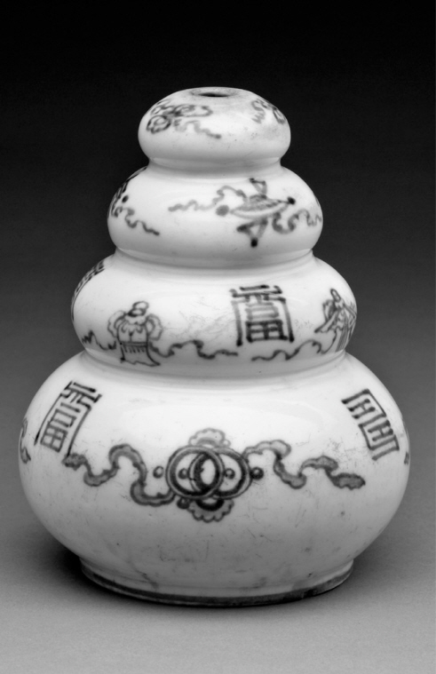 Vessel with Buddhist motifs, Korea, Joseon dynasty (1392？1910), 19th century, porcelain, 14.6 x 11.4 x 11.4 cm., Samuel P. Harn Museum of Art, gift of General James A. Van Fleet (1988.1.10)